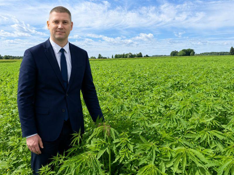 Sander Kuusk standing in RAK hemp field in Estonia, June 2026